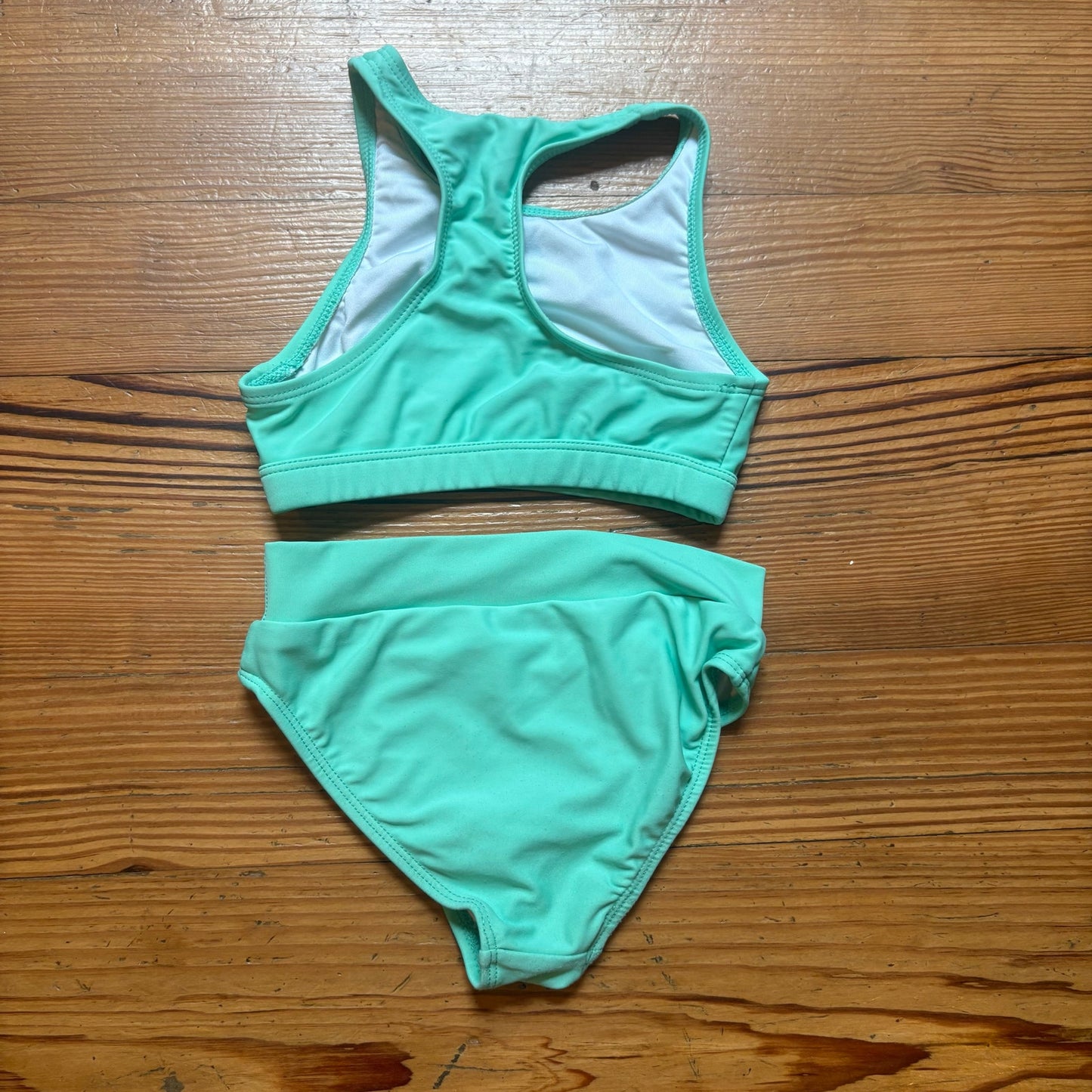 Infamous pastel green racer back girls swimsuit SIZE 4