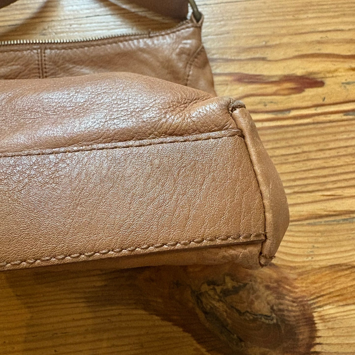 The Sak light brown leather floral embossed shoulder bag