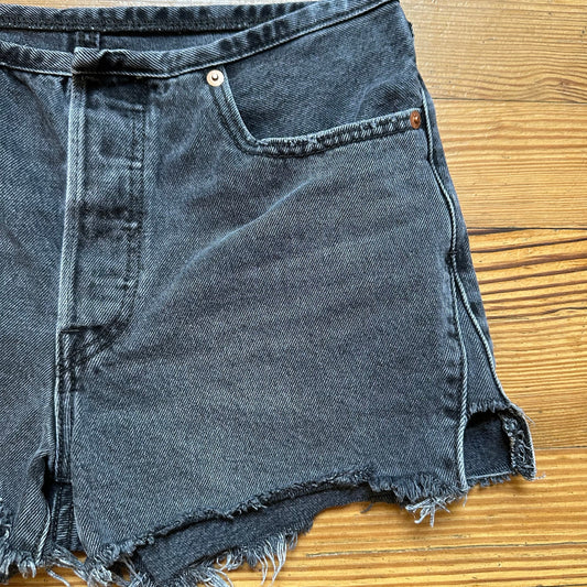 Levi's 501 distressed raw hem button fly black jean shorts SIZE 27