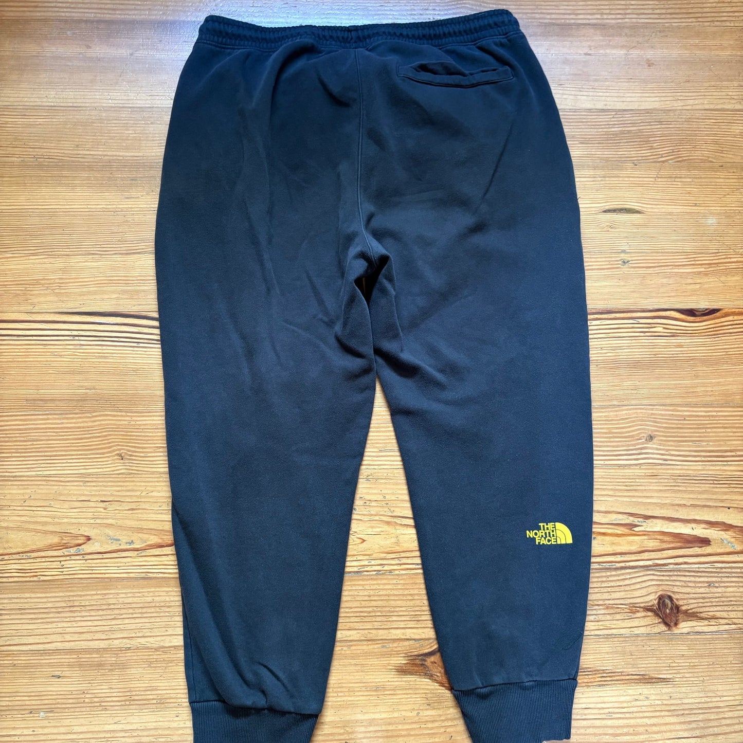 The North Face black elastic waistband yellow logo mens sweatpants SIZE XL