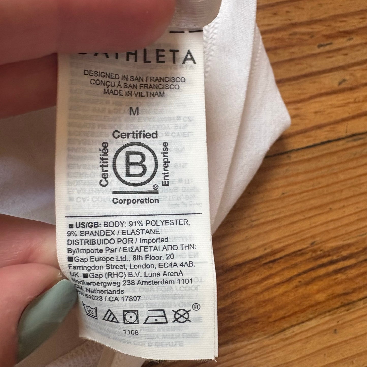 Athleta white full zip long sleeve hooded athletic shirt SIZE M