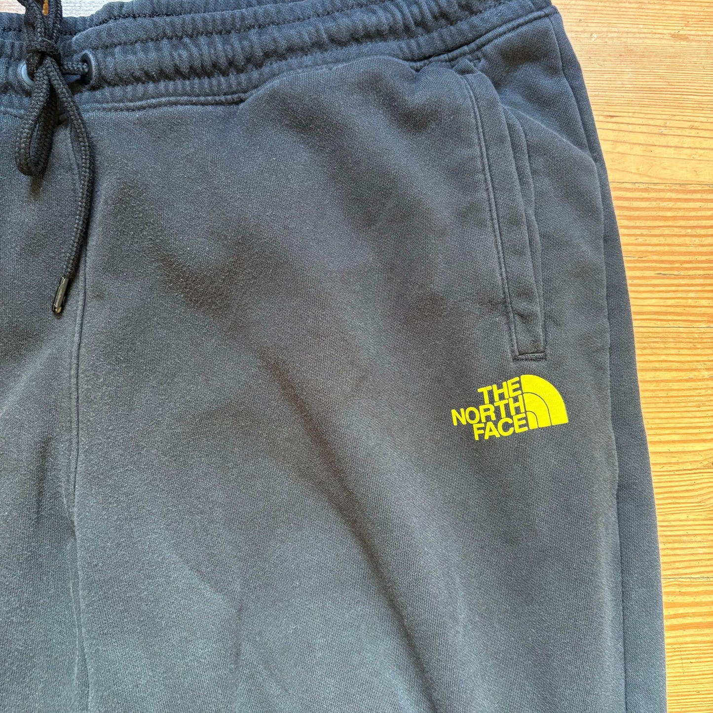 The North Face black elastic waistband yellow logo mens sweatpants SIZE XL