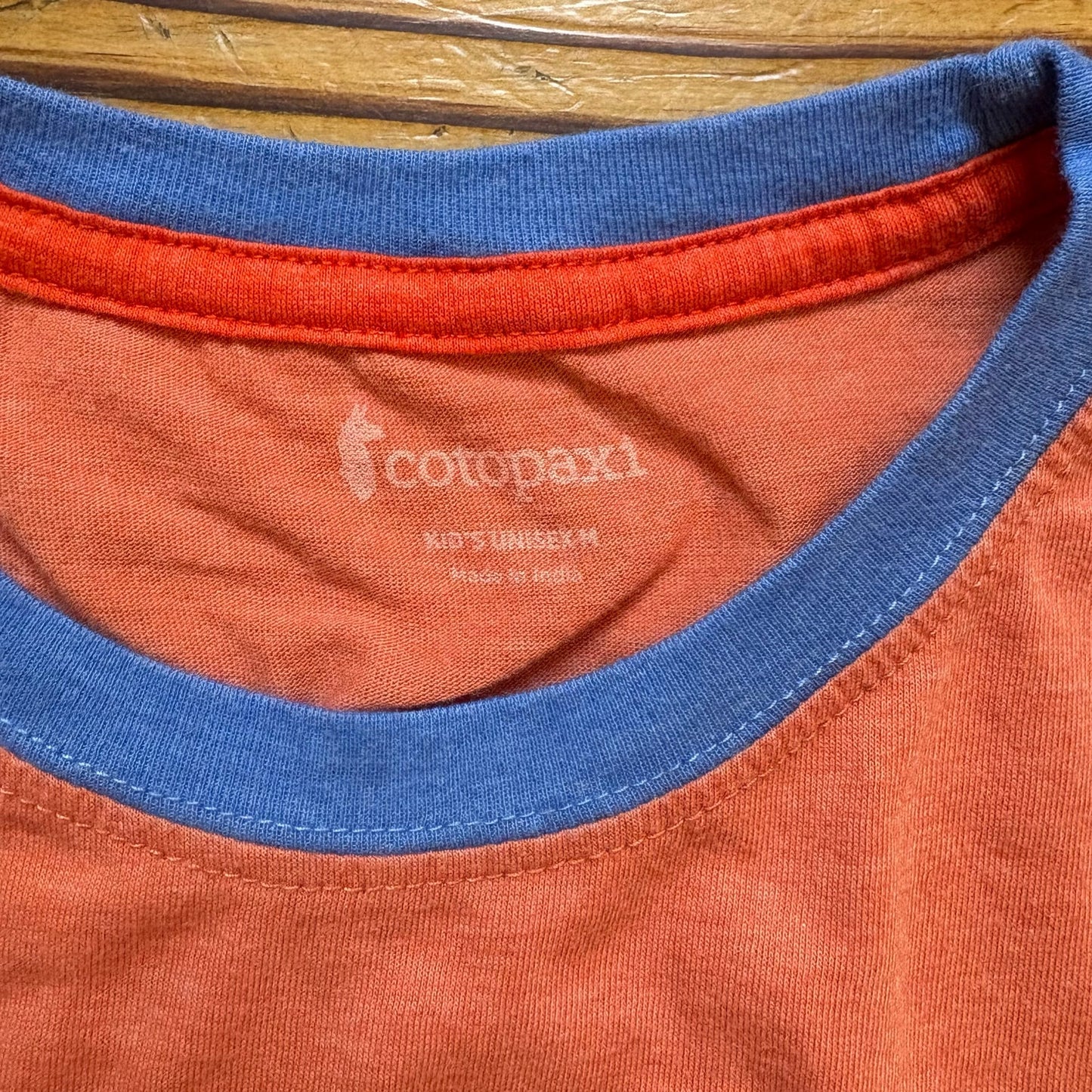 Cotopaxi orange llama Do Good graphic short sleeve unisex kids shirt SIZE M