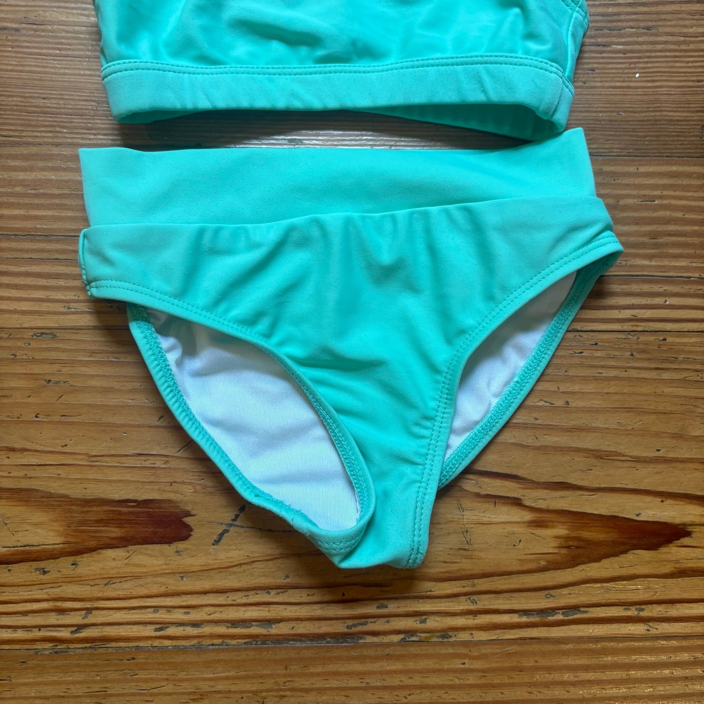 Infamous pastel green racer back girls swimsuit SIZE 4