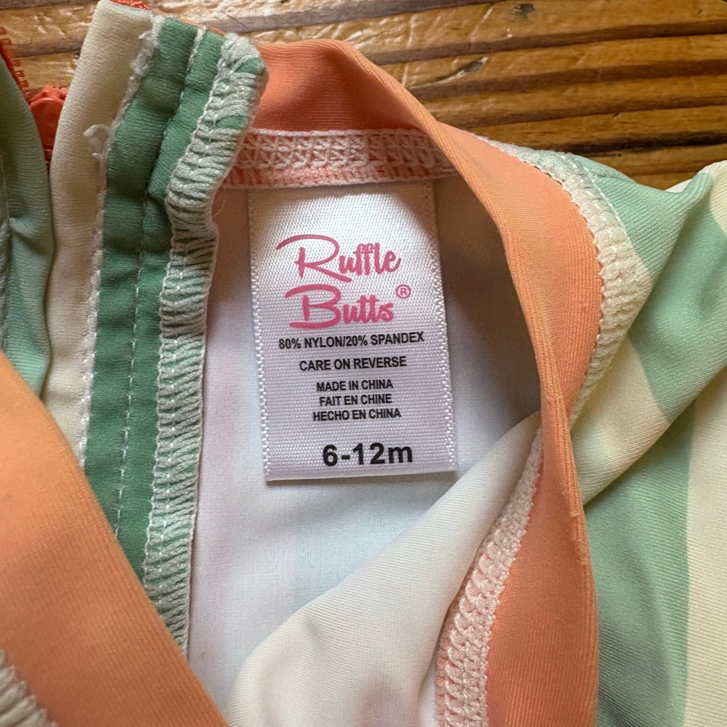 Ruffle Butts pastel striped long sleeve rah guard swimsuit SIZE 6-12M