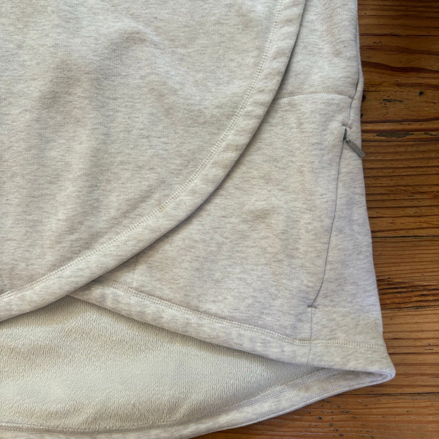 Athleta light gray asymmetrical zipper mock neck crisscross sweater SIZE S