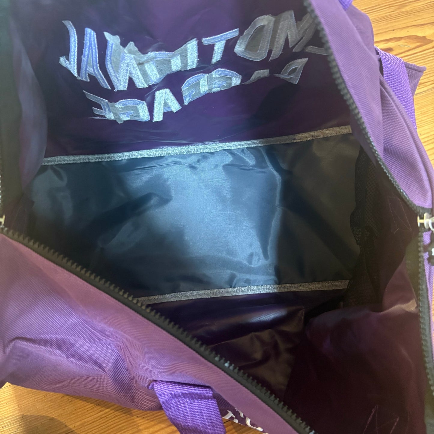 A**holes Live Forever purple Emotional Baggage large duffle bag