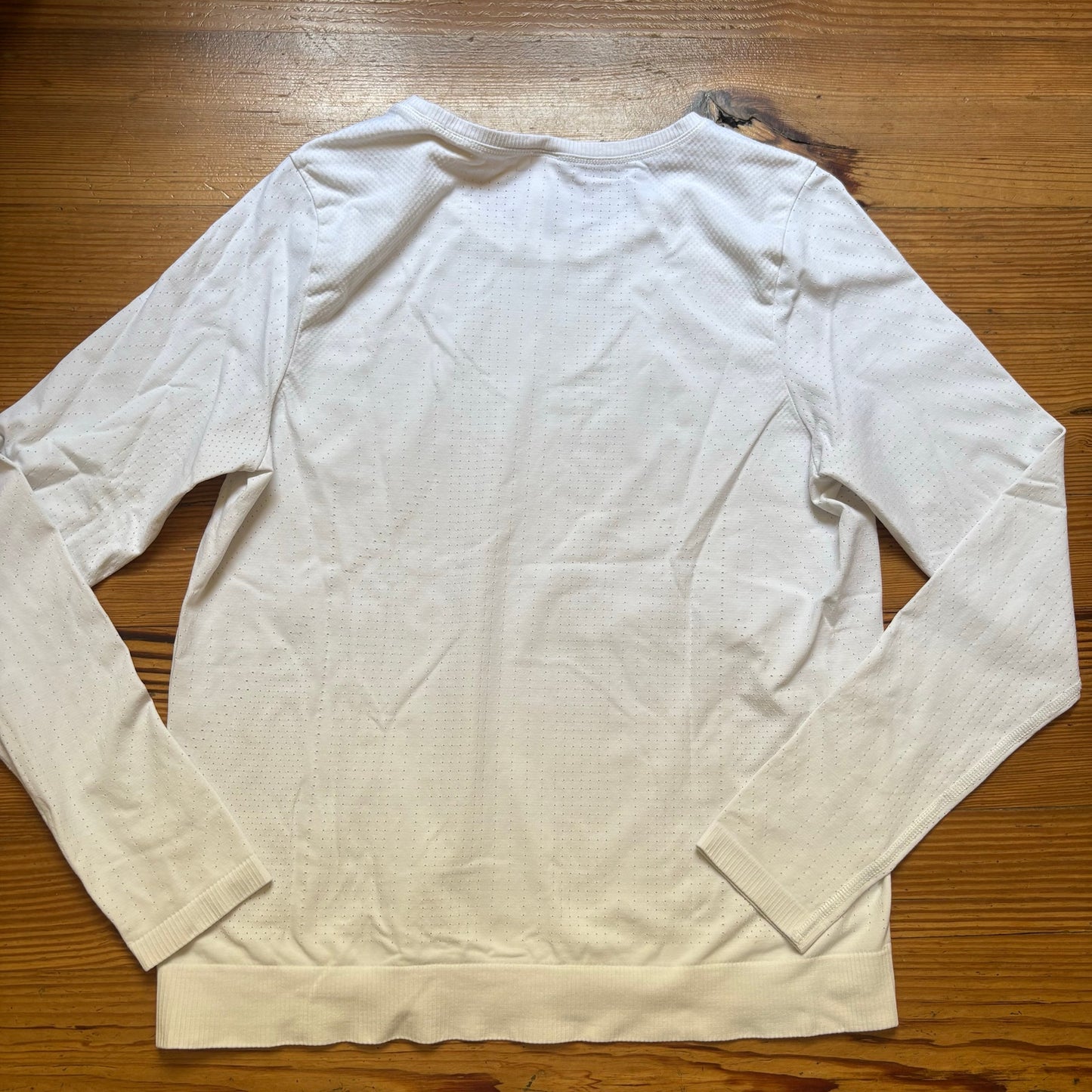 Athleta In Motion white perforate long sleeve seamless athletic shirt SIZE L