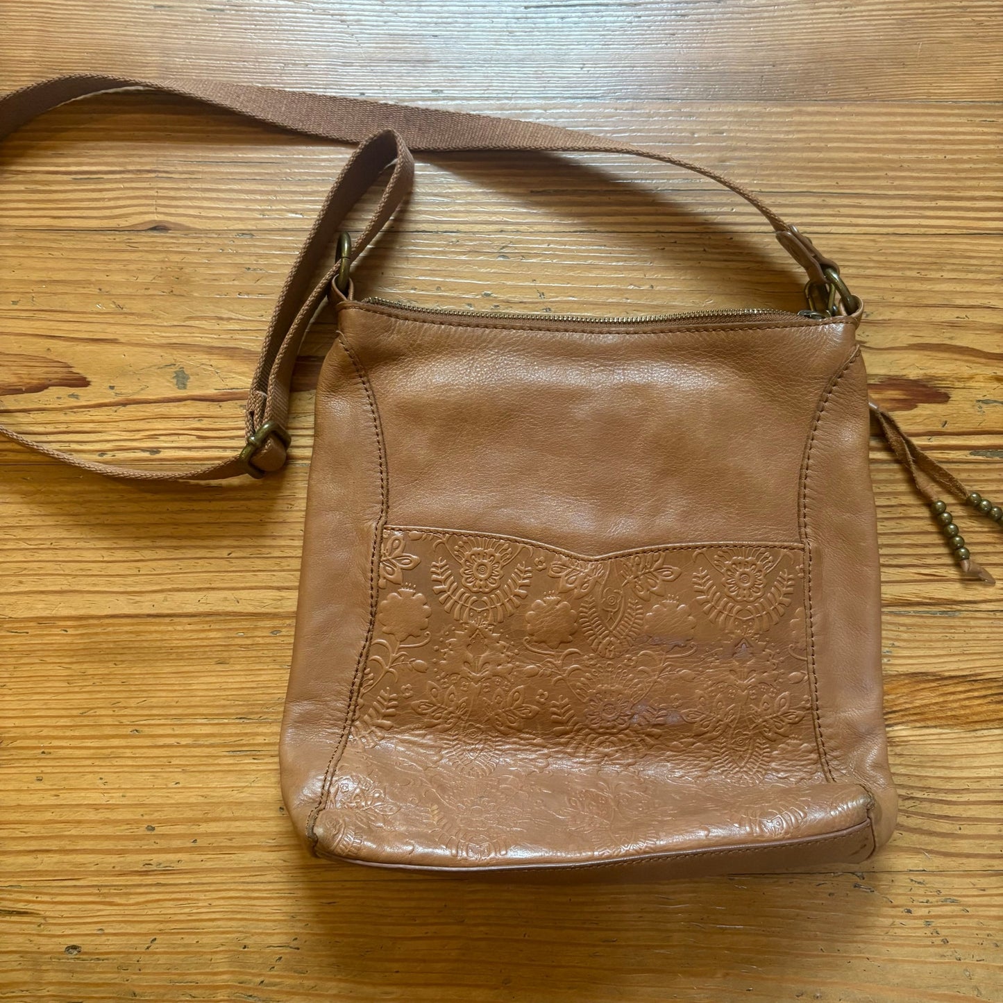 The Sak light brown leather floral embossed shoulder bag
