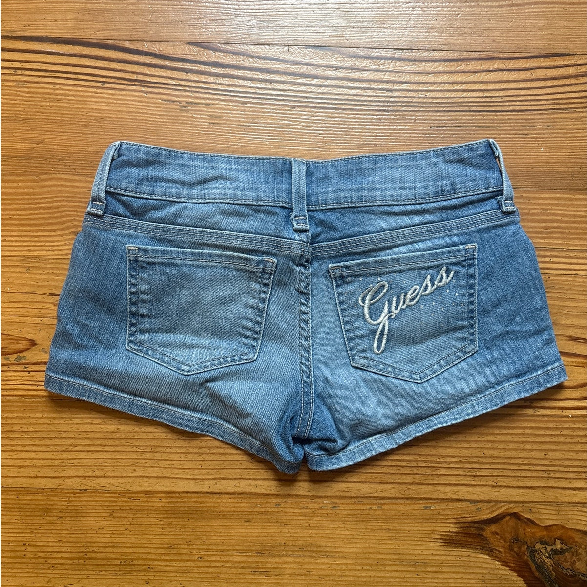 Guess light wash y2k jeweled pocket logo low rise jean shorts SIZE 25