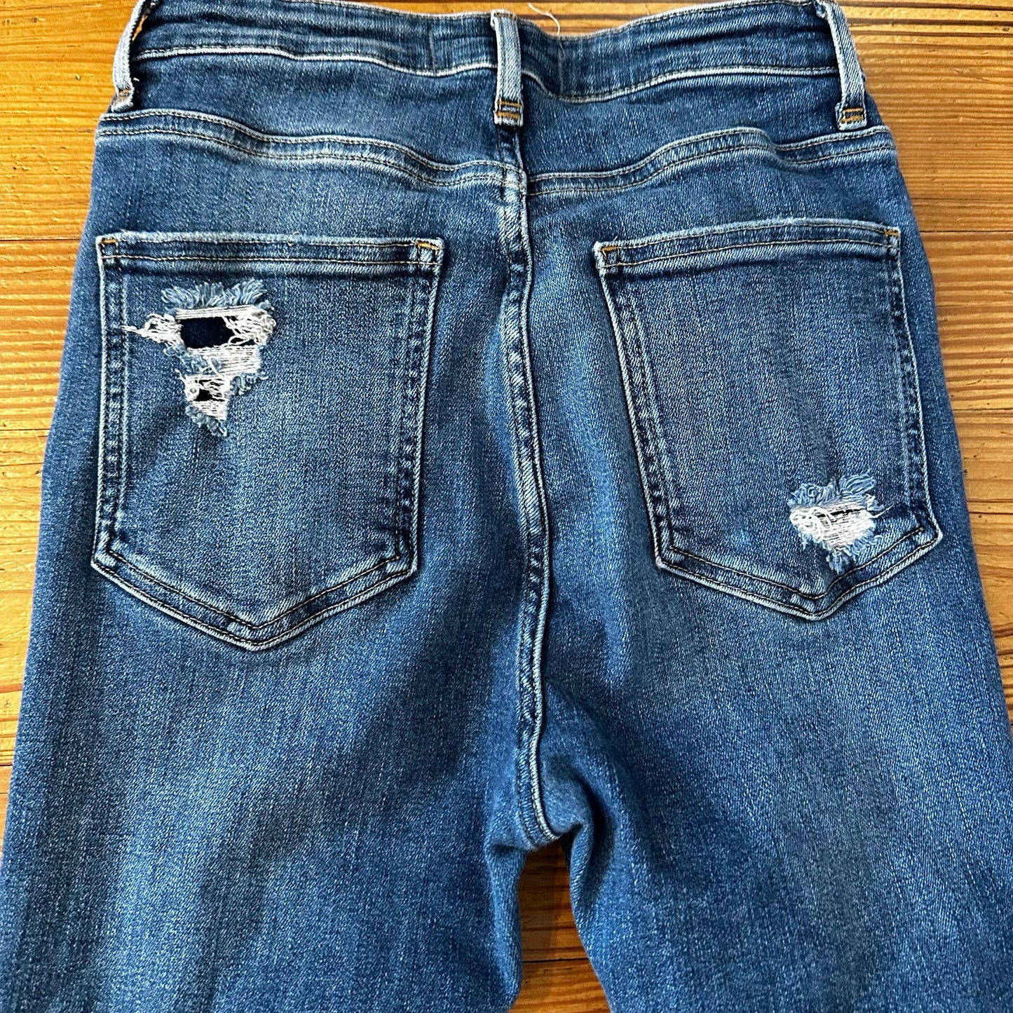 Free People medium wash distressed high rise button fly skinny jeans SIZE 27