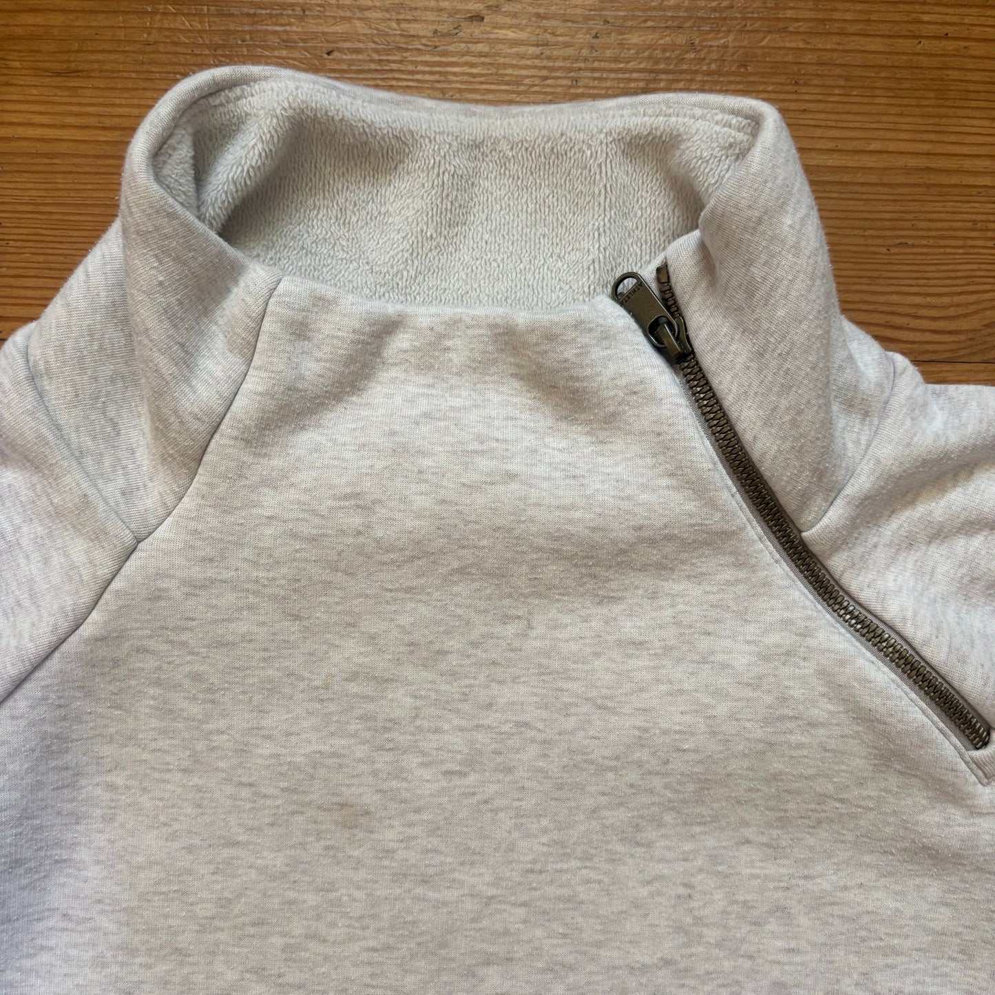 Athleta light gray asymmetrical zipper mock neck crisscross sweater SIZE S