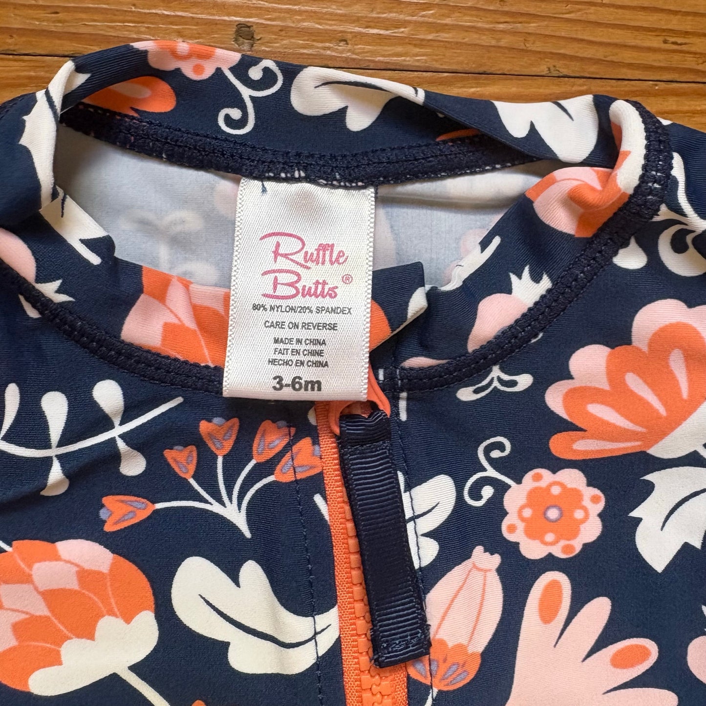 Ruffle Butts navy blue pink floral rashguard baby swim top SIZE 3-6M