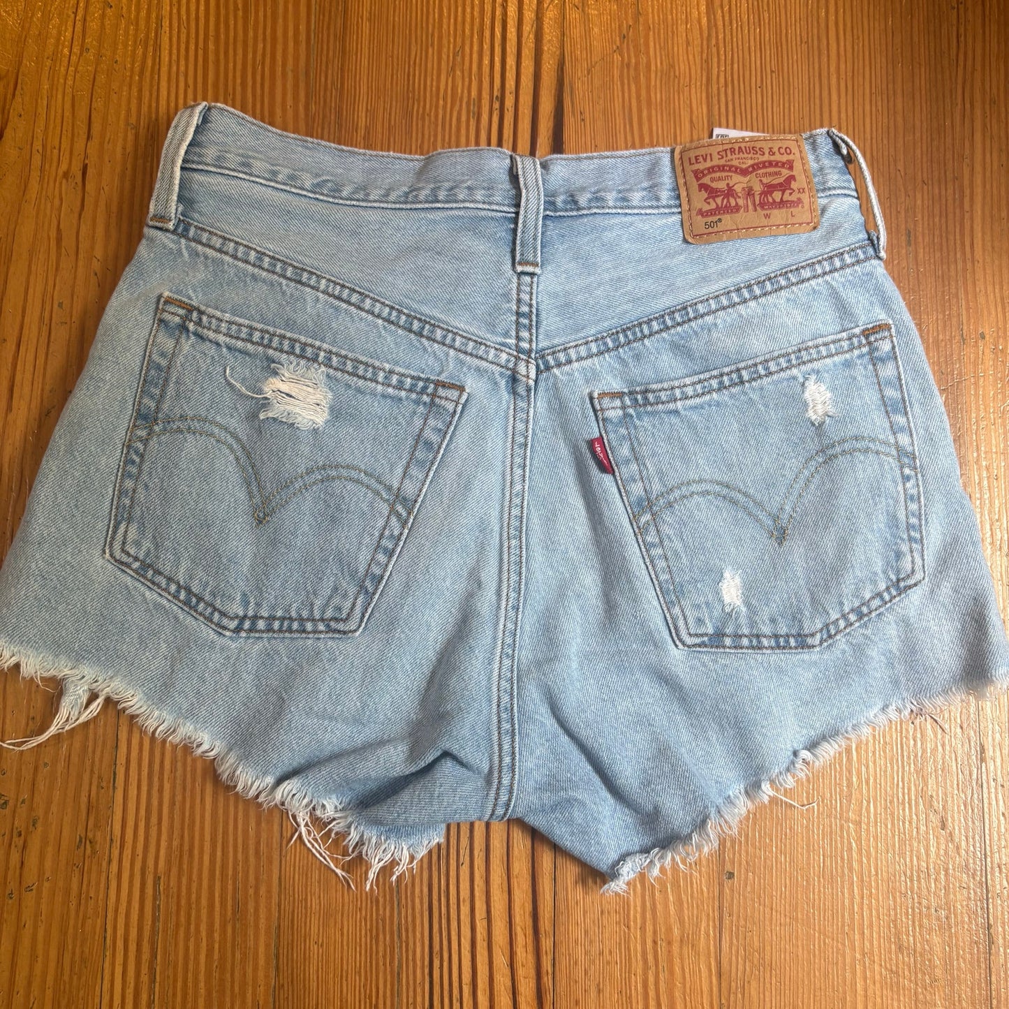 Levi's 501 light wash distressed button fly high rise shorts SIZE 0