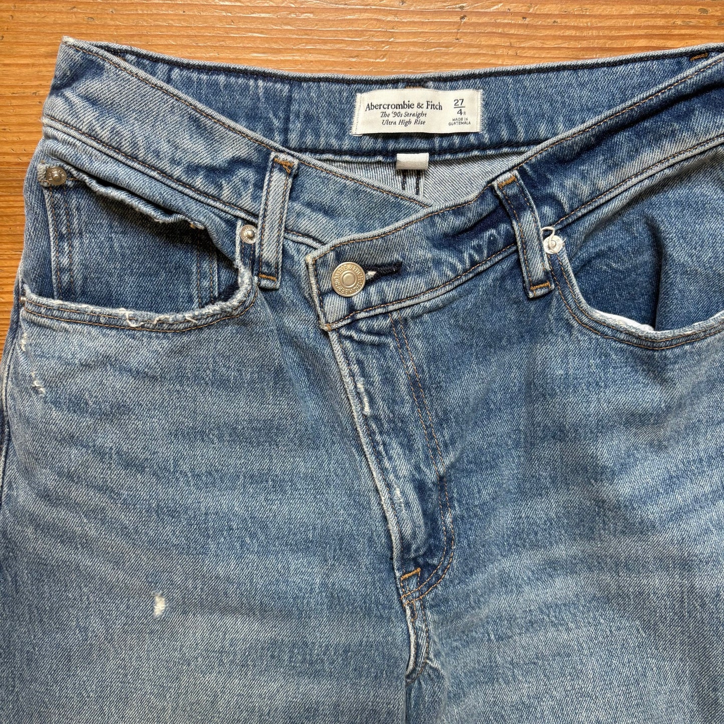 Abercrombie & Fitch medium wash asymmetrical button 90s high rise jeans SIZE 4
