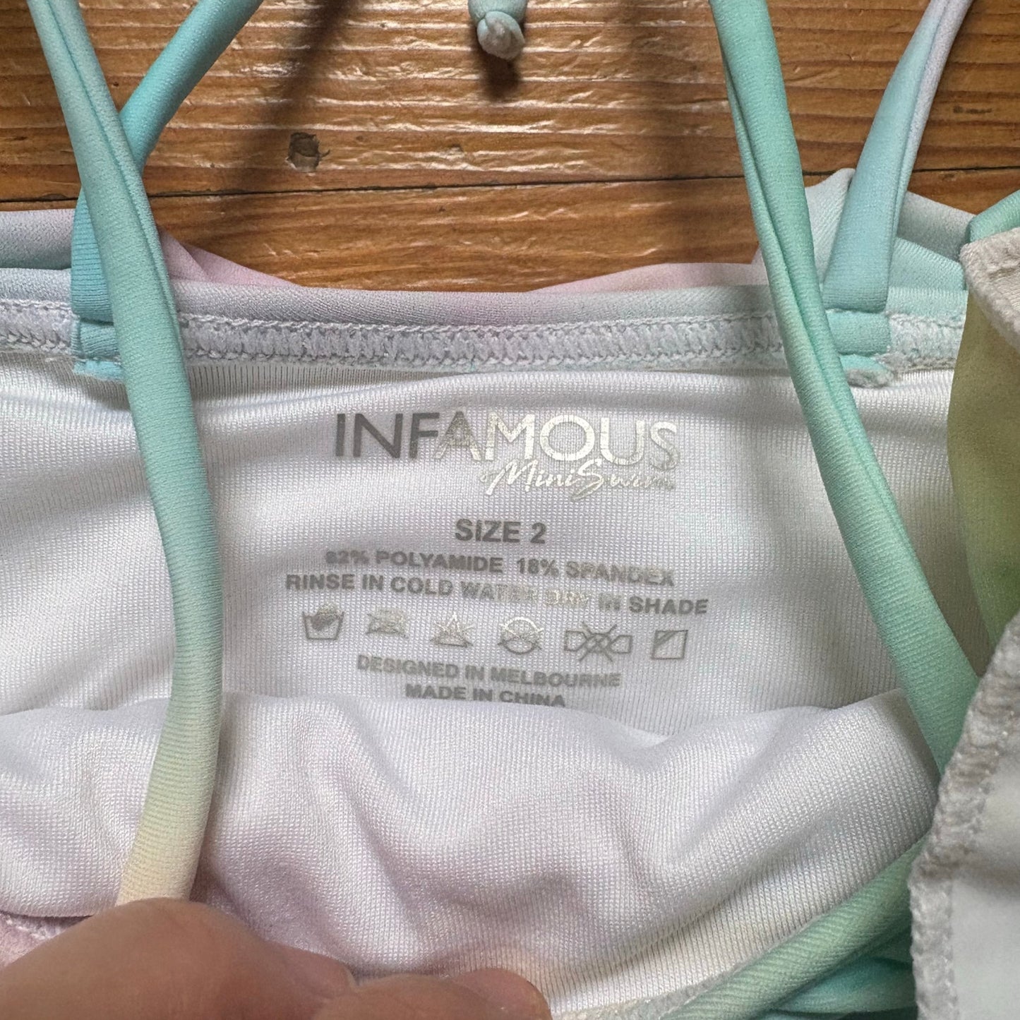 Infamous tie dyed ruffle top two piece toddler swimsuit SIZE 2
