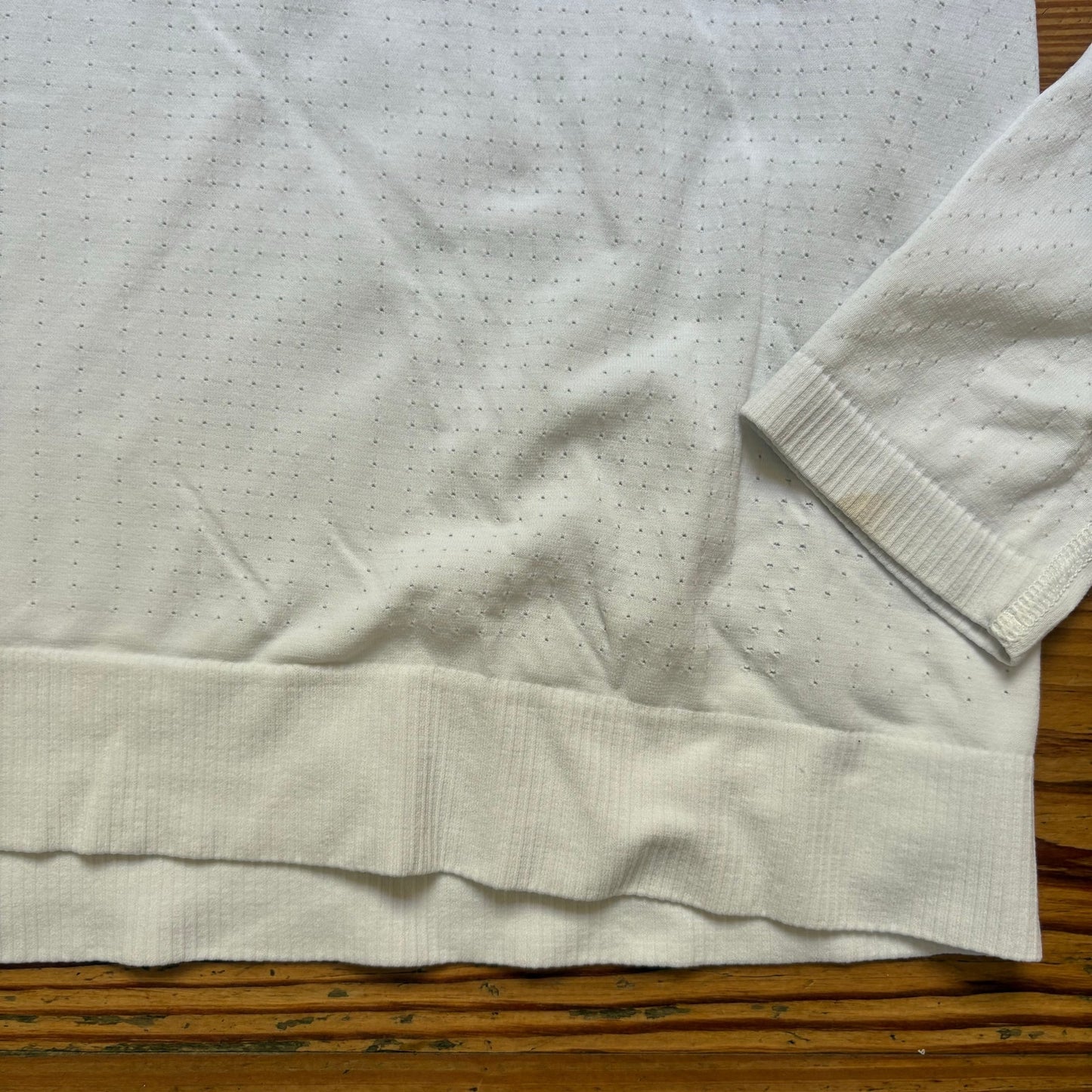 Athleta In Motion white perforate long sleeve seamless athletic shirt SIZE L