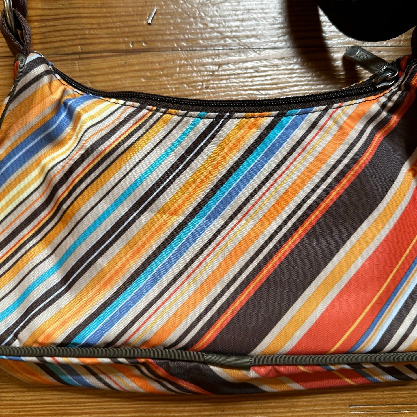Le SportSac yellow orange brown striped adjustable shoulder bag