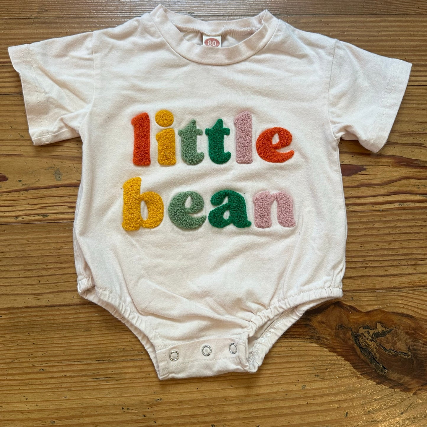 Shein cream Little Bean textured letter short sleeve bodysuit SIZE 12-18M