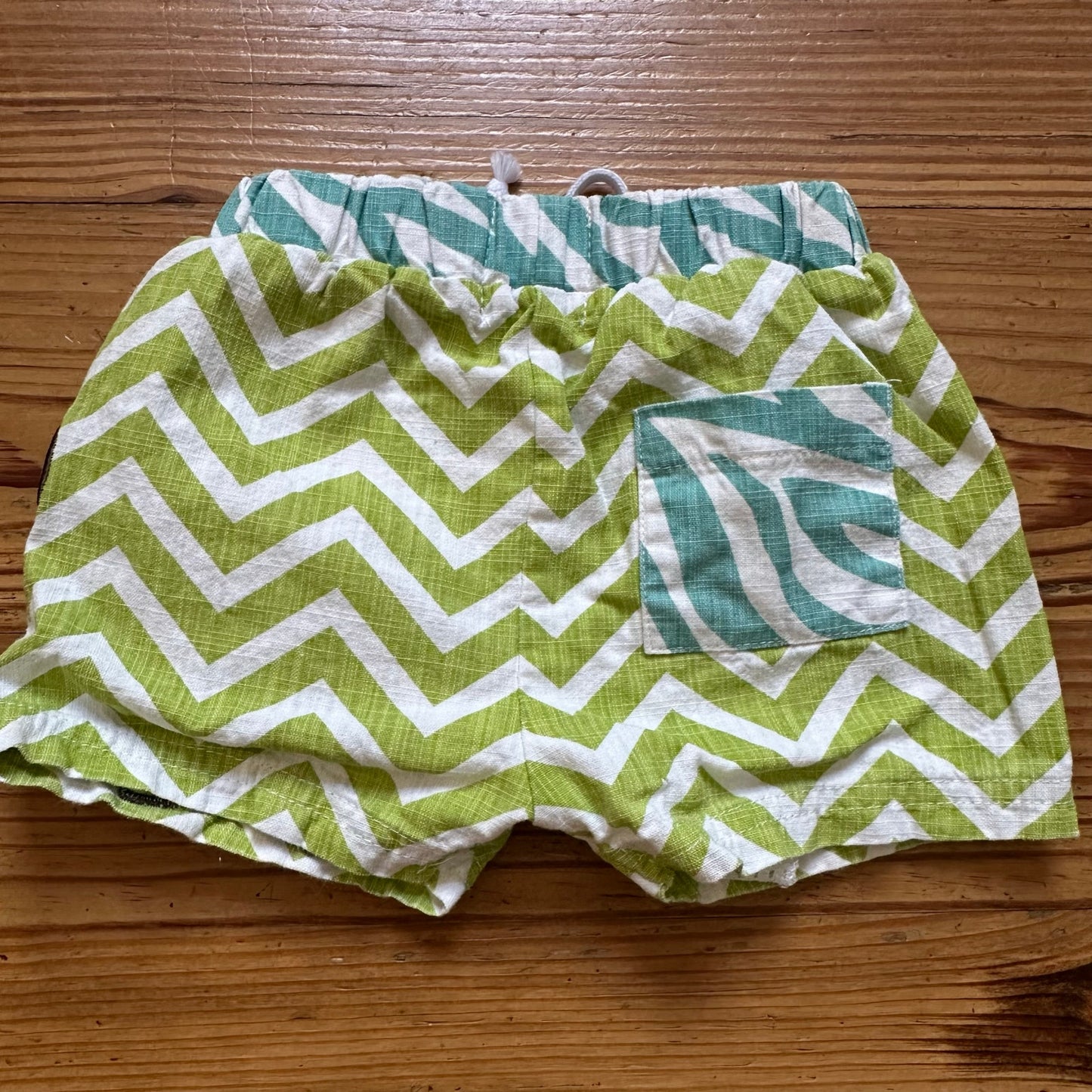 Mudpie green white elephant embroidered swim shorts SIZE 0-6M