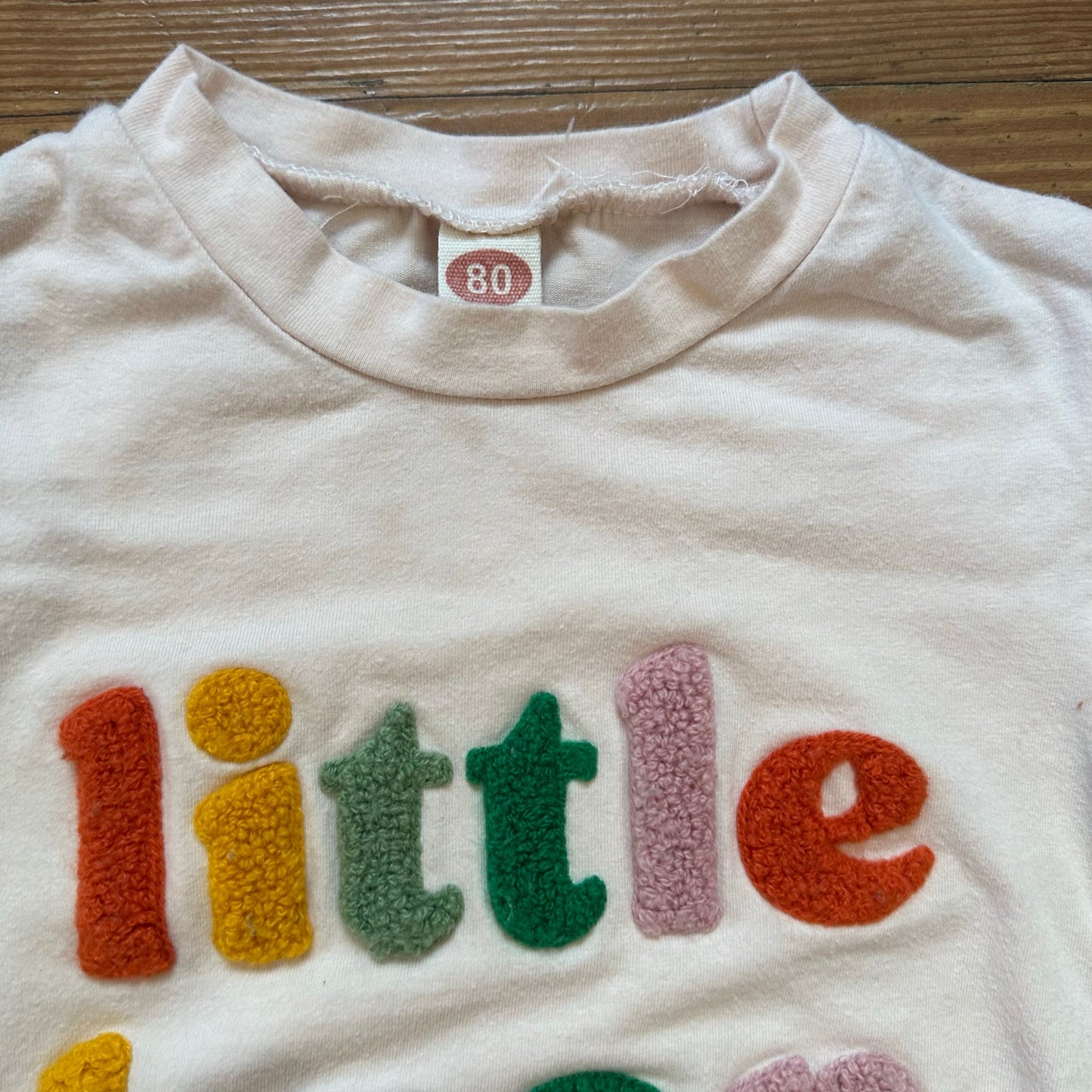 Shein cream Little Bean textured letter short sleeve bodysuit SIZE 12-18M
