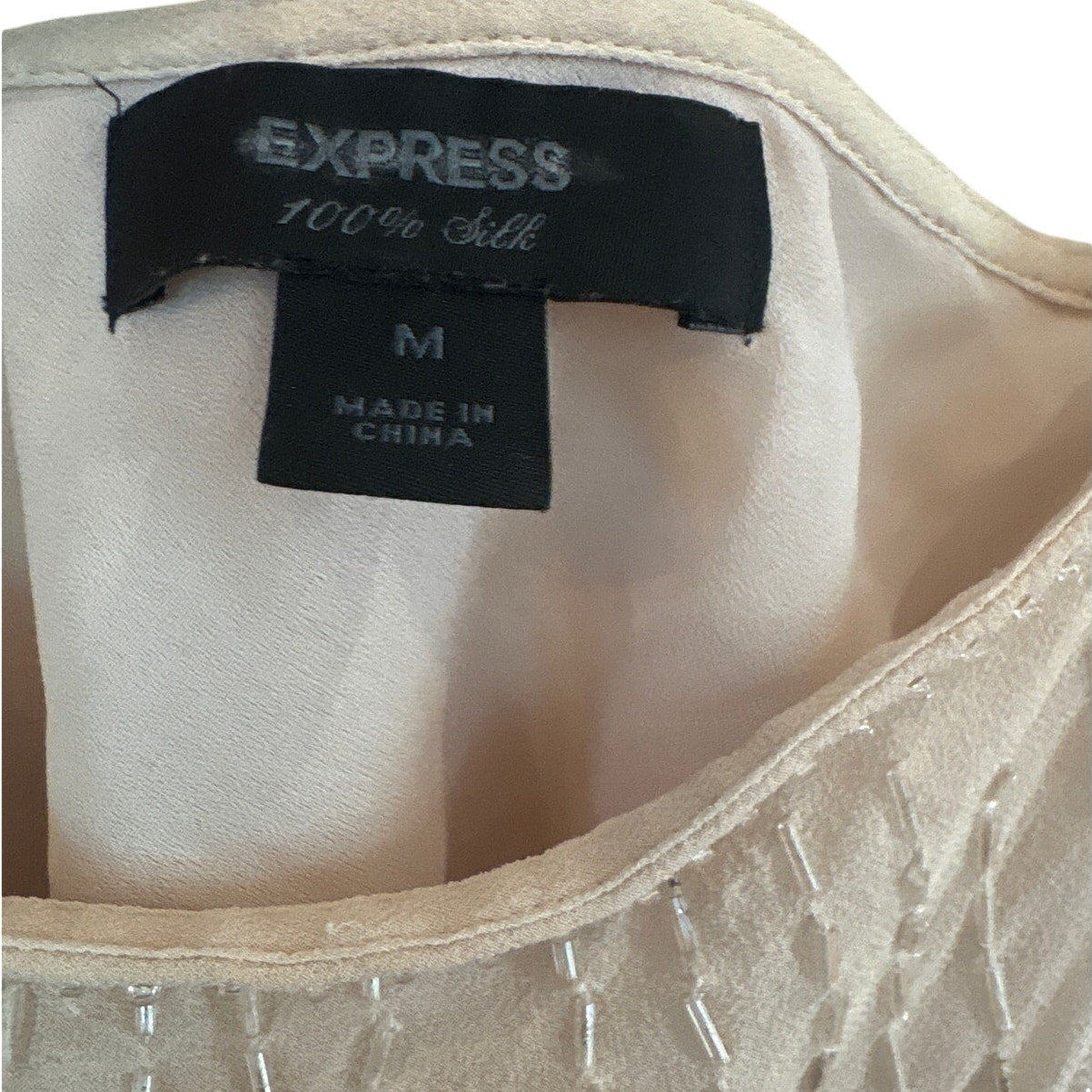 Express 90s ivory beaded silk ruffle sleeveless tie waist blouse SIZE M